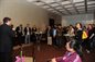 Alumni listening to the speeches during the reception