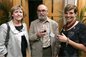 Alumni enjoying a drink at the reception