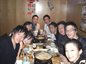 Alumni enjoy food at the reception