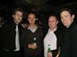Alumni  enjoying a festive drink at the London Christmas Party