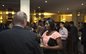 Alumni minlging with students