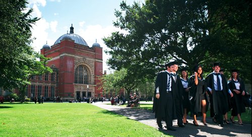 graduates gathered within Chancellor's Court