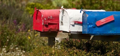 Photograph of US mailboxes in red, white and blue