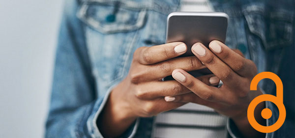 Image of a woman's hands looking at a phone. The Open Access logo sits in the bottom right hand corner