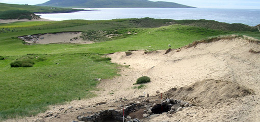 Photograph of an archaeological dig site on the coast of a Scottish island
