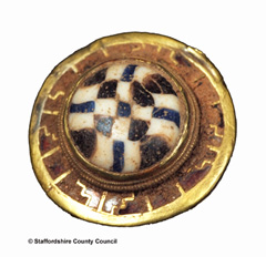 Photograph of a gold item from an excavation
