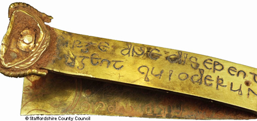 Photograph of a gold item from an excavation