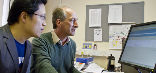 Photo of Paul Thompson with student