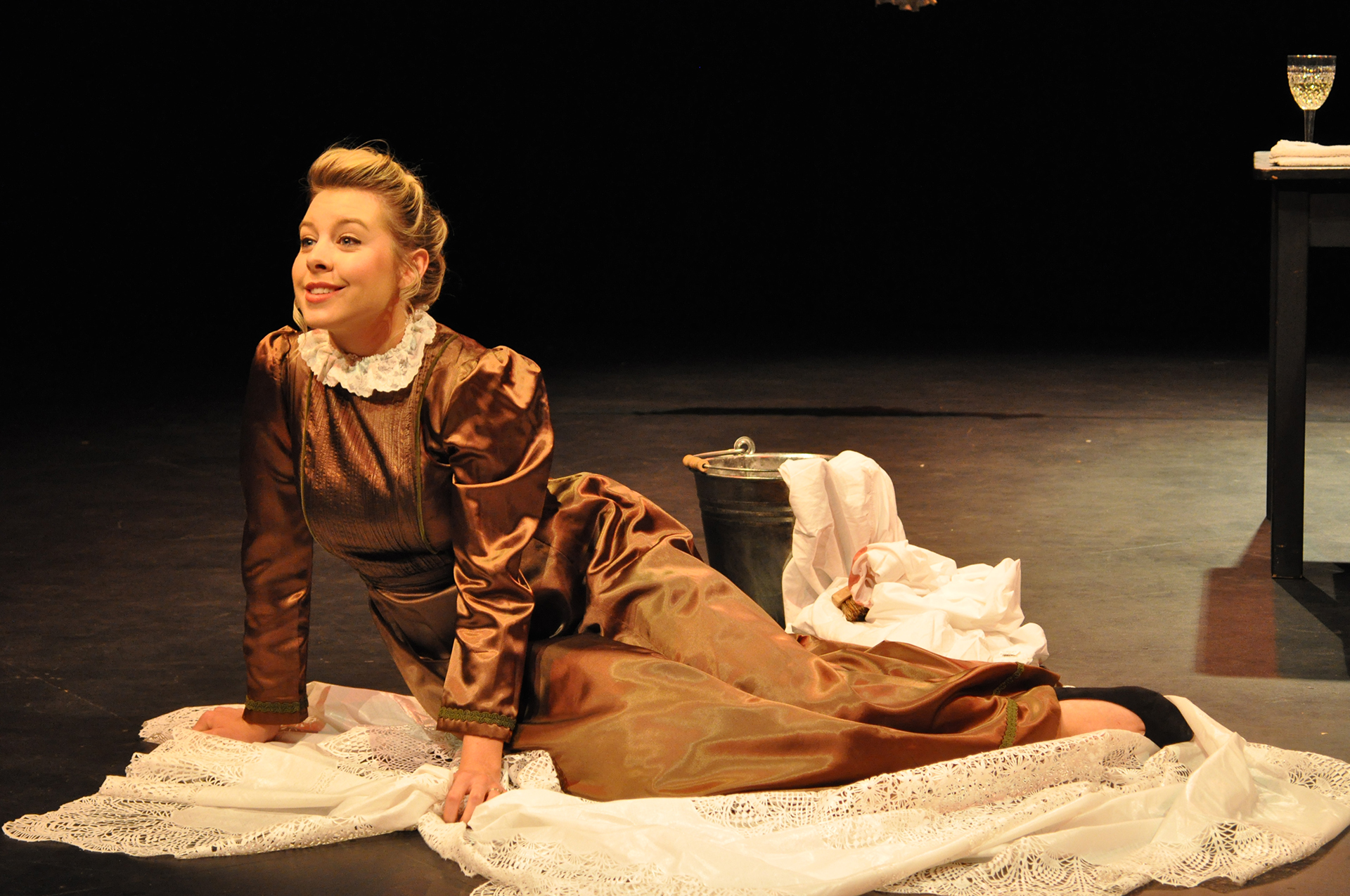 Drama student on stage in performance