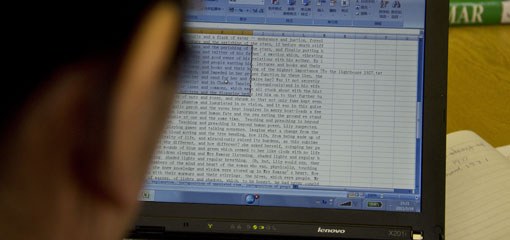 Photo of research student at PC