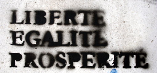 Photograph of graffiti declaring liberte egalite prosperite