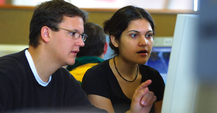 Students studying at a computer