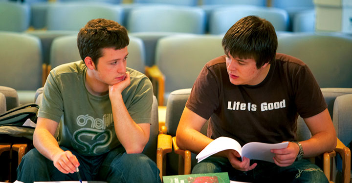 Students studying a textbook