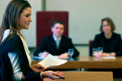 Photograph of students holding a Moot