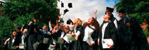 Picture of mortar boards flying on Graduation Day