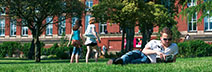 Picture of student studying outside the University of Birmingham's main library