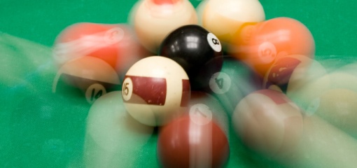 Photograph of billiard balls colliding