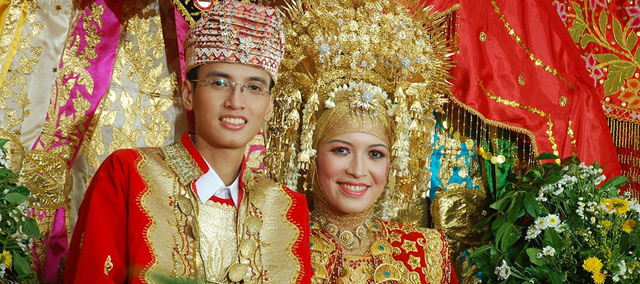A Minangkabau wedding ceremony in Indonesia. Photo by Mamasamala via creative commons