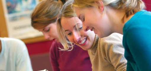 Photograph of undergraduate students in conversation