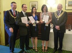 Jenny Hopkins being awarded graduate of the year