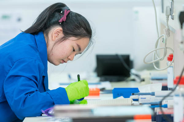 Chinese student working in a lab