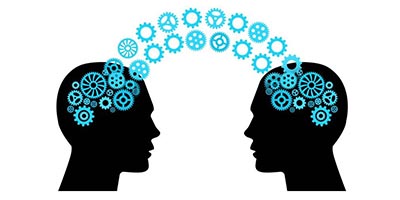 graphic of two heads with symbols and cogs moving between them