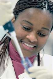 Chemical Engineering student with pipette
