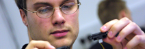 Student with electronic components