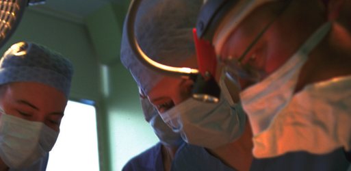 Medicine students undertaking surgery