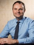 Professor Adam Tickell