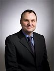 Professor Adam Tickell