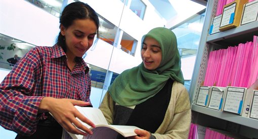 Staff helping student