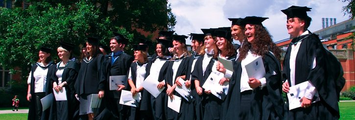 Graduates posing for a photograph following a Degree Congregation