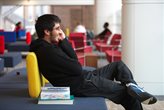 Student chatting on mobile phone