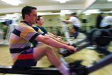 man on a rowing machine