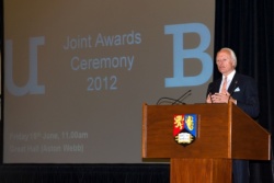 A photograph of guest speaker Andrew Garner at the Joint Awards Ceremony