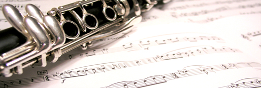 An image of a clarinet on some sheet music