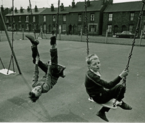 Nick Hedges, boys on swings, from the &ldquo;Shelter&rdquo; series Birmingham Libraries & Archives&copy;Nick Hedges