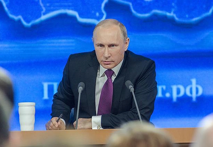 Vladimir Putin speaking at a press conference