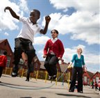 Children skipping in the playground