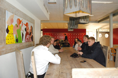 Social work students academics and service user contributor meet Director at Pupil Referral Unit in Rotterdam
