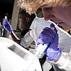 Student using centrifuge