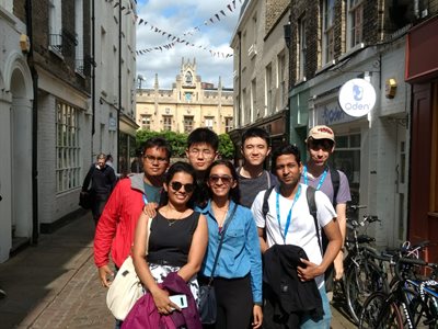 Students exploring cobbled streets in Cambridge