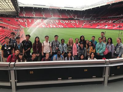 Students visiting the Old Trafford Football Stadium in Manchester