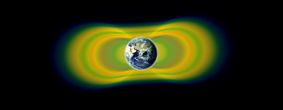Green and yellow radiation belts swirling around the Earth, identified by NASA’s Van Allen Probes.