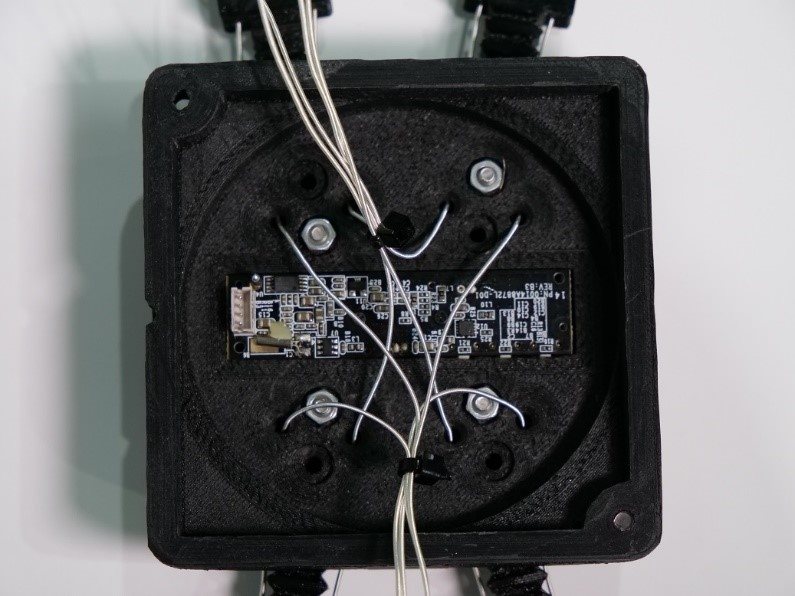 Bottom view of the slip detector system embedded on the palm of the gripper