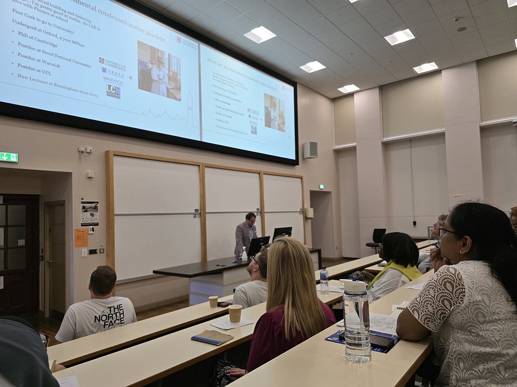 A speaker presenting at the 2024 Physics Conference