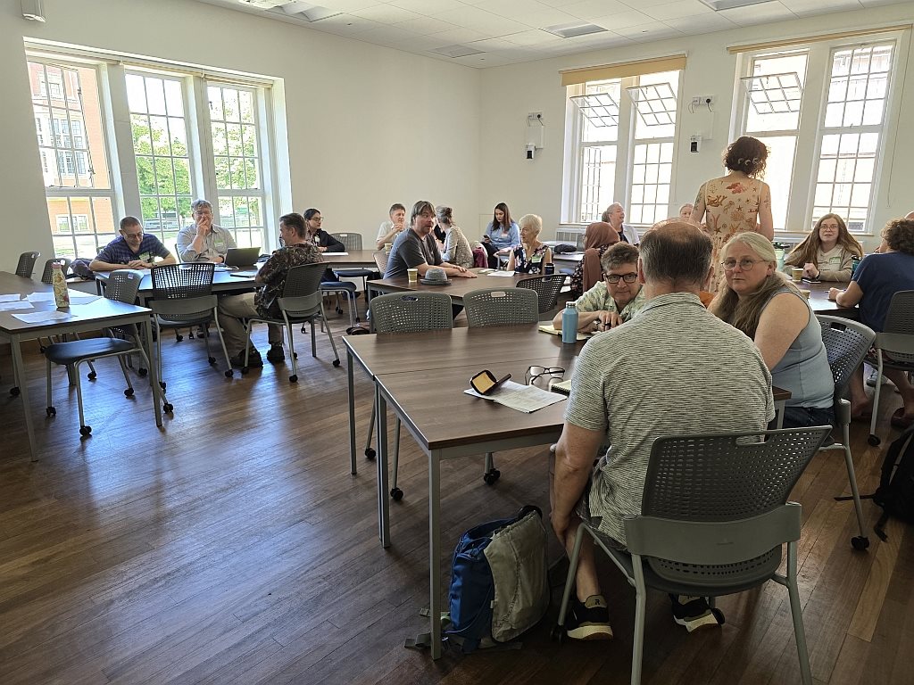 A speaker presenting at the 2024 Physics Conference