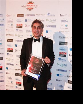 Dr Nandra, holding the individual award for Best Young Dentist in the Midlands