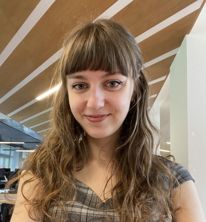 A young woman in an archive.